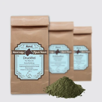 Braune Papiertüte mit der Bezeichnung 'Druckfrei' für Hundesupplemente, mit blauer Schrift, die Unterstützung für Nieren, Blase und Entgiftung beschreibt.