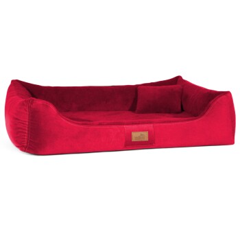 Rotes plüschiges Haustierbett mit erhöhten Kanten und einem kleinen Rückenkissen, mit einem beigen Etikett, das "tierland" liest.