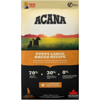 ACANA Puppy Large Breed Recipe Hundefutterbeutel mit einem Sonnenuntergangshintergrund und zwei Hunden, der frisches kanadisches Huhn und rohe Flunder hervorhebt.