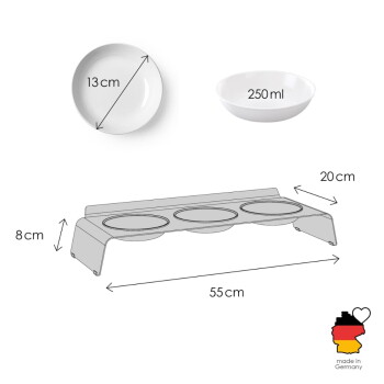 Erhöhter Dreifach-Futternapf mit weißen Schalen Ø 13 cm, 250 ml auf einem Ständer 55×20×8 cm; 'Hergestellt in Deutschland'-Symbol.