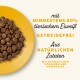 Schüssel mit Haustierfutterkibbles auf einem gelben Teller, mit Etiketten für "80% tierisches Protein", "getreidefrei" und "natürliche Zutaten."