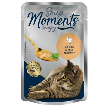 Cat food pouch featuring "Soup Moments" with chicken, labeled "Mit Huhn" and "Extra Moist," alongside a cat looking at the pouch.