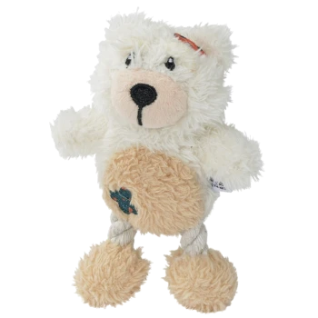 Ein flauschiges, weißes Teddy-Bär-Hundespielzeug mit einem beigen Bauch und Seilbeinen, ausgestattet mit einem süßen Gesicht und einem kleinen gestickten Design auf dem Bauch.