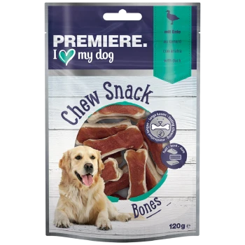 A golden retriever sits beside a package of "Premiere I ♥ my dog" chew snack bones, featuring a duck flavor, 120g.
