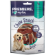 Ein Golden Retriever sitzt neben einem Paket von "Premiere I ♥ my dog" Kauknochen, mit Enten-Geschmack, 120g.