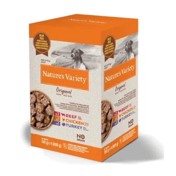 Boîte de nourriture pour animaux de compagnie Nature's Variety Original présentant du boeuf, du poulet et de la dinde, avec une étiquette sans céréales et une image de chien sur le côté.