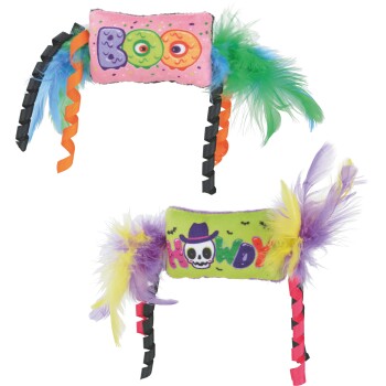 Two feathered cat toys: pink plush 'BOO' with green/blue feathers; green plush 'MEOW' with skull and purple/yellow feathers.