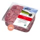 Verpacktes rohes Rindfleisch für Hunde, beschriftet mit "proCani buy nature," mit einem rot-weißen Design und dem deutschen Text "Rindfleisch pur."