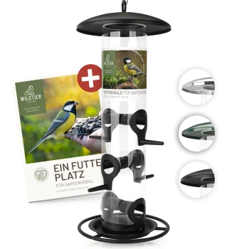 Futtersäule für Samen, Körner & Kerne 35cm, Schwarz Vogelfutterspender mit transparentem Rohr und schwarzem Sockel, mit einem Etikett, das "Futtersäule für Gartenvögel" und ein Vogelbild zeigt.