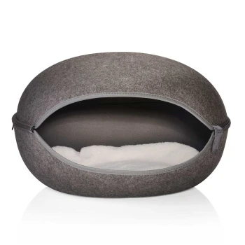 Graues Haustierbett mit runder Form, mit einem Reißverschluss und einem weichen weißen Innenfutter.