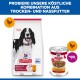 Hill's Science Plan Trockenfuttersack und Nassfutterdose mit schwarz-weißem Hund, Aufschrift 'Adult 1–6' sowie Hühner- und Kuhsymbolen.