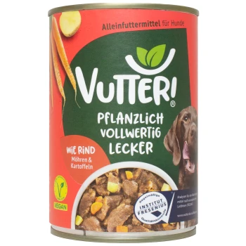 Vutter! pflanzliche Hundefutterdose mit einem braunen Hund, mit dem Text 'Pflanzlich Vollwertig Lecker' und 'Wie Rind, Möhren & Kartoffeln.'