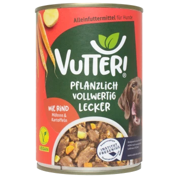Vutter! pflanzliche Hundefutterdose mit einem braunen Hund, mit dem Text 'Pflanzlich Vollwertig Lecker' und 'Wie Rind, Möhren & Kartoffeln.'