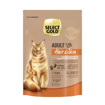 Emballage de nourriture pour chats Select Gold Adult Hair & Skin mettant en vedette un chaton roux duveteux. Les points forts du texte incluent "Geflügel mit Lachs" et "Weizenfreie Rezeptur."