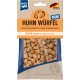 Mini-Hühnchenwürfel für Hunde in einer klaren Tüte, beschriftet mit "Huhn Würfel," mit einer Hundillustration und dem Text "Made in Germany."