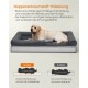 Labrador auf grauem orthopädischen Hundebett; Überschrift 'Noppenschaumstoff-Polsterung' und Vergleichsbeschriftungen 'Unsere' vs. 'Andere'.