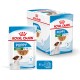 Emballage de nourriture Royal Canin Puppy Mini, présentant une image de petit chien, étiqueté pour les chiots âgés de 2 à 10 mois, 85g x 12.