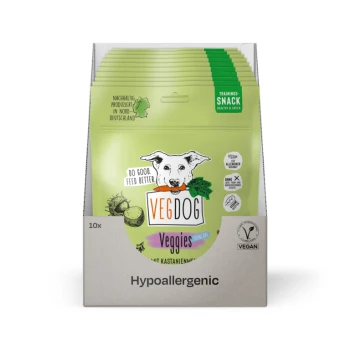 VegDog Trainingssnacks in einer grünen Box, mit einem Cartoon-Hund und Text, der gesunde, umweltfreundliche Haustierleckereien bewirbt.