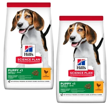 Zwei Tüten Hill's Science Plan Welpenfutter, beschriftet mit "PUPPY <1" und "MEDIUM 11-25 KG," Hühnergeschmack, fördert Immunität und Wachstum.