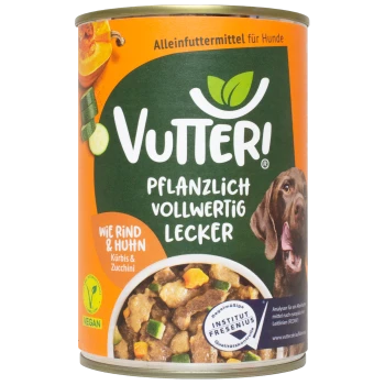Vutteri veganes Hundefutter-Dose mit einem braunen Hund auf dem Etikett, mit dem Text "Pflanzlich Vollwertig Lecker" und "Wie Rind & Huhn".