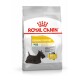 Sac de nourriture pour chiens Royal Canin Dermacomfort Mini, mettant en avant une silhouette de chien noir, souligne "Formule Réduite en Allergènes" et "91% des propriétaires satisfaits."