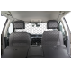 A black pet barrier netting is installed between the front and back seats of a car, preventing pets from accessing the front.