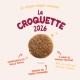 Ronde bruine brokjes op crèmekleurige achtergrond, kop 'La Croquette 2026'; opmerkingen: vers vlees, geoptimaliseerde vezels, klein formaat