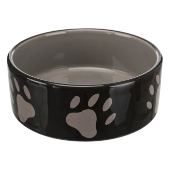 Bol de nourriture pour animaux noir avec une finition brillante, présentant des motifs de pattes gris clair autour de l'extérieur et un intérieur gris lisse.