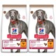 Zwei Tüten Hill's Science Plan Hundefutter, beschriftet mit 'Adult 1-5 Large 25KG+' mit 'No Grain' und 'Huhn #1 Zutat' deutlich angezeigt.