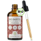 Drei Flaschen BIO Barf Öl für Haustiere, mit Omega 3-6-9 und natürlichem Vitamin E, neben einer Pappschachtel mit Grafiken zur Tierpflege.