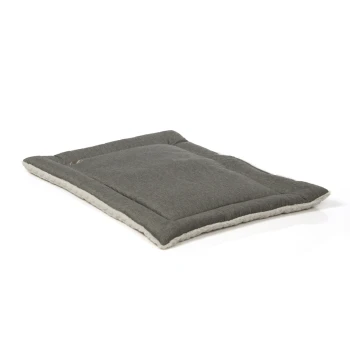 Graues Haustierbett mit einem plüschigen weißen Rand, das ein weiches, gepolstertes Zentrum für Komfort bietet.