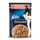 Verpackung für Katzenfutter mit Felix Sensationen mit Lachs in einer Sauce, zeigt eine Schüssel mit zerrissenem Fleisch und einem verspielten Katzenbild.