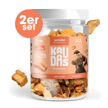 Hundeleckerlis in einem klaren Glas mit dem Etikett "KAUDAS" und einem Bild eines Hundes, mit "Lachs" und "Training & Belohnung".