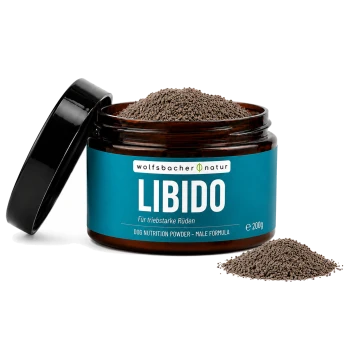Ein braunes Päckchen mit der Aufschrift 'Libido Balance Pulver' mit grünen und blauen Akzenten, das 'Unterstützt ein ausgewogenes Verhalten' für Hunde angibt, 100 Gramm.