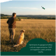 Grüner Canvas-Hundetrainingsdummy mit Seil und Knebel, mit schwarzen „R“-Buchstaben nahe der Oberseite.