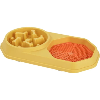 Gelb-orangefarbene Slow-Feeder-Hundeschale mit knochenförmigen Hindernissen und strukturierter Oberfläche zur Beschäftigung des Haustiers.