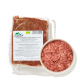 Vakuumverpackung mit Aufschrift „Rindermuskelfleisch Extra, Nettomasse 500g“ und Schale mit rohem, gehacktem Rindfleisch für Haustiere