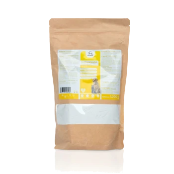 Braune Papiertüte mit einem Nahrungsergänzungsmittel für Hunde, beschriftet mit 'Dicalciumphosphat', mit einem gelben Abschnitt, der ein Hundebild und Nährwertangaben zeigt.