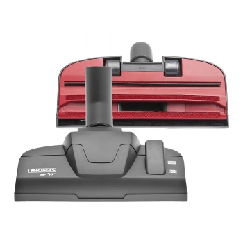 Tierhaarbodendüse Ein schwarzes und rotes Staubsaugerzubehör mit einem breiten Reinigungsaufsatz und einem zentralen Anschluss, mit dem Thomas-Logo.