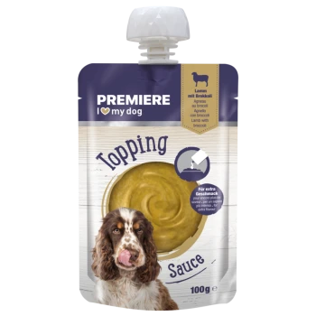 Premiere I love my dog Topping Sauce lam met broccoli hondenvoertopping 100g met een hond die zijn lippen likt op de verpakking.