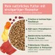Hundefutter-Schüssel mit Kroketten, Rind, Cranberries, Kartoffeln und Karotten; deutsche Überschrift „Rein natürliches Futter...“.
