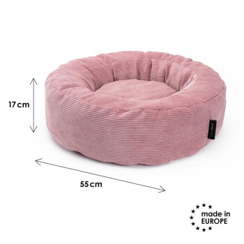 Rundes, rosafarbenes Cord-Haustierbett mit schwarzem Etikett, 55 cm Durchmesser und 17 cm Höhe; "made in EUROPE"-Label.