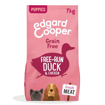 Pink bag of Edgard Cooper puppy food, 7kg, labeled "Grain Free" with "Free-Run Duck & Chicken" and "fresh meat" text.