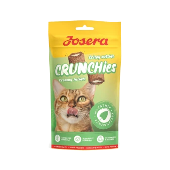 Josera Crunchies Katzenleckerlis Verpackung mit einer Katze, die sich die Lippen leckt, beschriftet mit knusprig außen, cremig innen, mit Katzenminze, getreidefrei, zuckerfrei, Taurin & Vitamine.