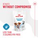 Royal Canin Training Treats package featuring a smiling dog, stating "Reward Without Compromise" and "Less than 3 calories per piece."