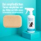 Eine Flasche von GREEN HERO Trockenshampoo für Pferde neben einem Schwamm, mit Text, der eine sanfte Anwendung für empfindliche Tiere empfiehlt.