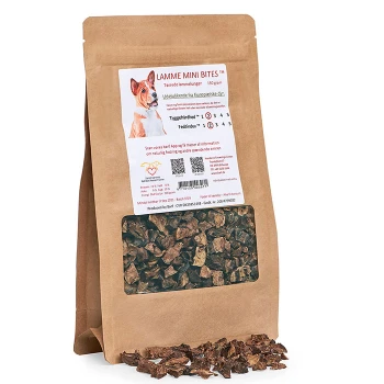 Braune Papiertüte mit "Lamme Mini Bites" Hundeleckerlis mit einem klaren Fenster, das getrocknete Lammstücke und ein beschriftetes Hundebild zeigt.