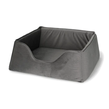 Lit pour animaux de compagnie gris avec un tissu doux et pelucheux et des côtés bas pour un accès facile, conçu pour le confort et la détente.