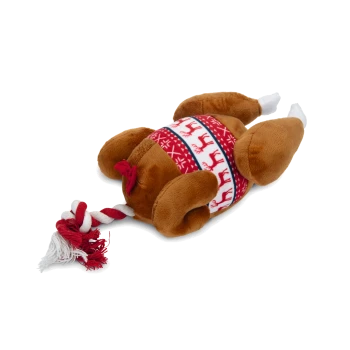 Plush turkey dog toy with red and white reindeer sweater pattern and red and white rope tail on white background.