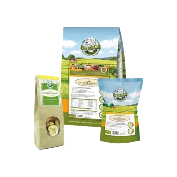 Drei BELLFOR Tierfutterprodukte: ein großer "Gutshof-Schmaus" Beutel, ein kleiner "Knabber-Snacks" Leckerli-Beutel und ein blauer "Fleischstreifen" Beutel.